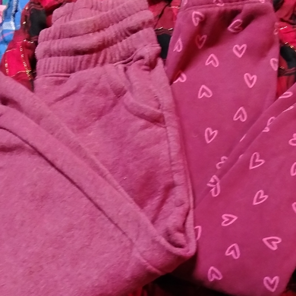 TWO pairs of burgundy Cat & Jack sweat pants.